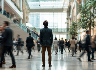 What 2026 Data on AI Workplace Anxiety Means for Your Events AI keynote speakers addressing workforce anxiety at a corporate event